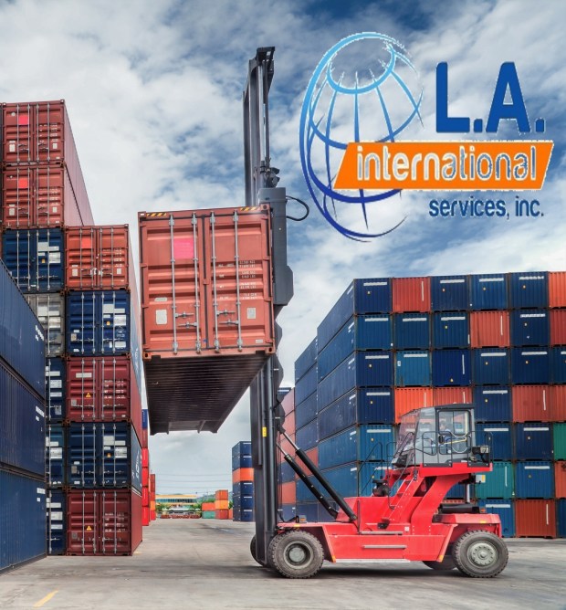 Crane lifter handling container box loading to truck in import export logustic zone